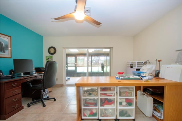 office area with light tile patterned floors and ceiling fan