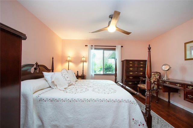 bedroom with ceiling fan and dark hardwood / wood-style flooring