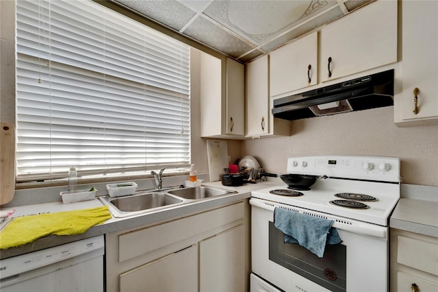 kitchen with white appliances and sink