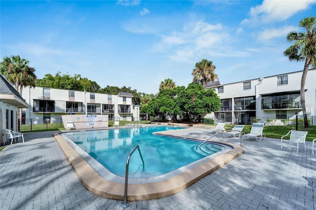 view of pool featuring a patio