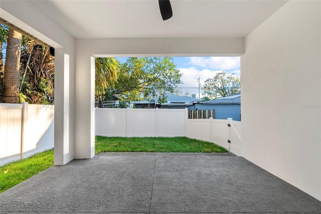 view of patio featuring ceiling fan