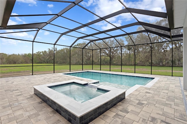 outdoor pool featuring a lanai, a patio area, and an in ground hot tub