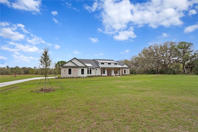 view of front facade with a porch and a front yard