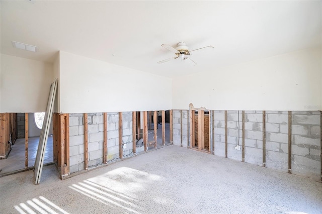 unfurnished room featuring ceiling fan