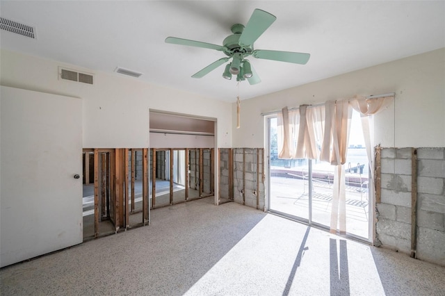 spare room with ceiling fan