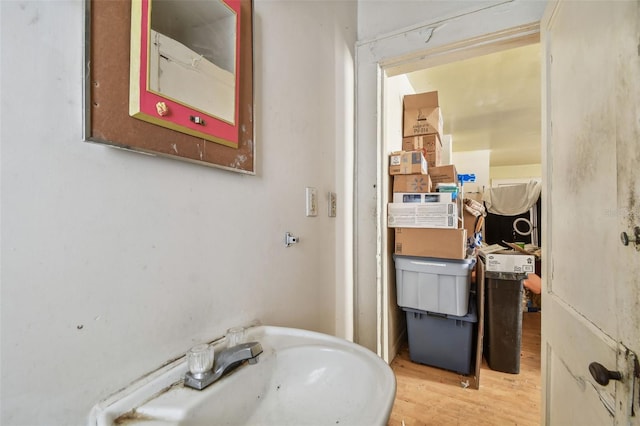 bathroom featuring sink and hardwood / wood-style flooring