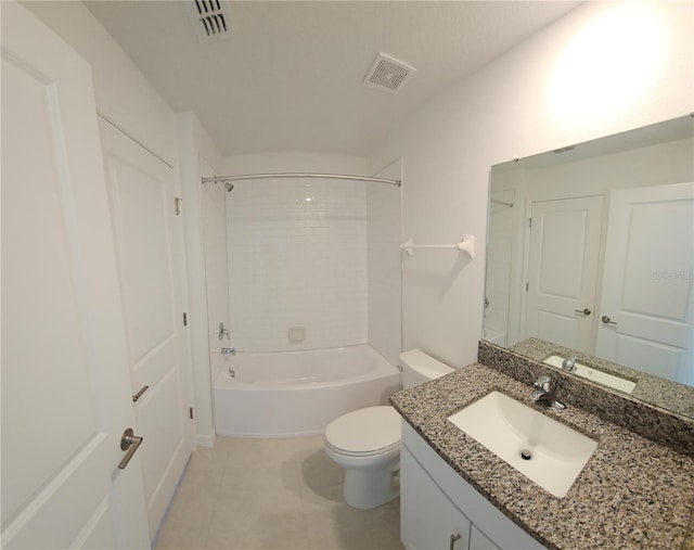 full bathroom with vanity, toilet, and tiled shower / bath