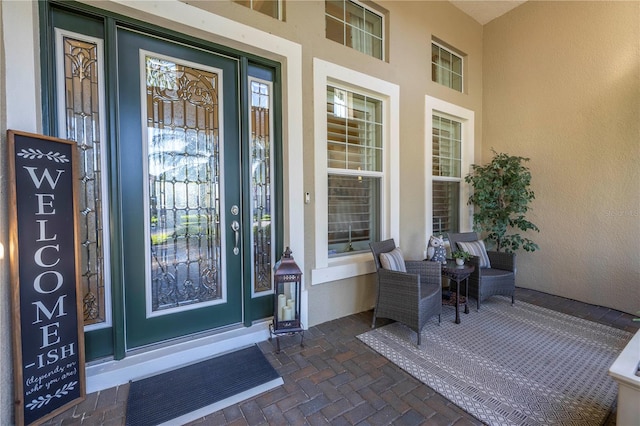 entrance to property with a porch