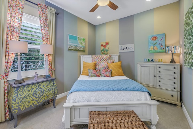 carpeted bedroom featuring ceiling fan