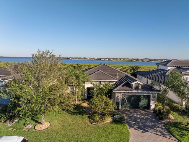 drone / aerial view featuring a water view