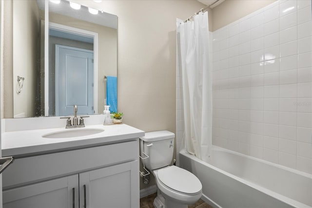 full bathroom with vanity, toilet, and shower / tub combo with curtain