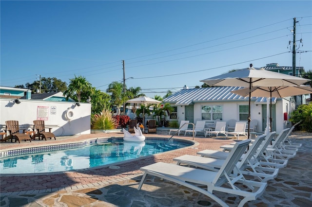 12321 Gulf Blvd, Treasure Island, FL 33706 - community pool featuring a patio area