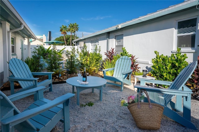 12321 Gulf Blvd, Treasure Island, FL 33706 - fenced backyard with a patio