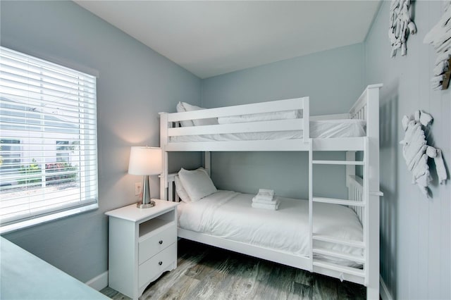 12321 Gulf Blvd, Treasure Island, FL 33706 - bedroom featuring wood finished floors and baseboards