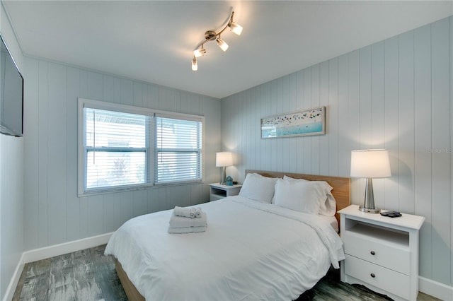 12321 Gulf Blvd, Treasure Island, FL 33706 - bedroom with baseboards and wood finished floors