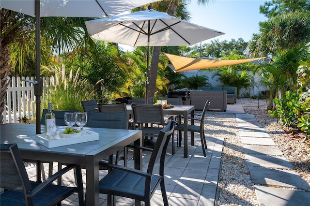12321 Gulf Blvd, Treasure Island, FL 33706 - view of patio featuring outdoor dining area