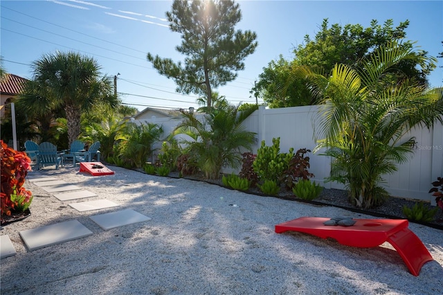 12321 Gulf Blvd, Treasure Island, FL 33706 - view of patio / terrace featuring an outdoor fire pit