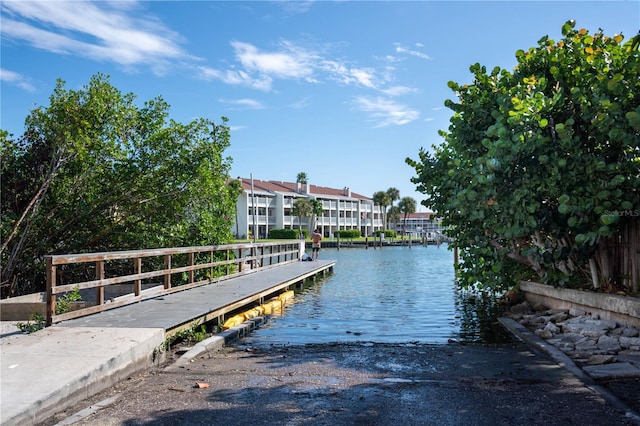 12321 Gulf Blvd, Treasure Island, FL 33706 - dock featuring a boat ramp and a water view