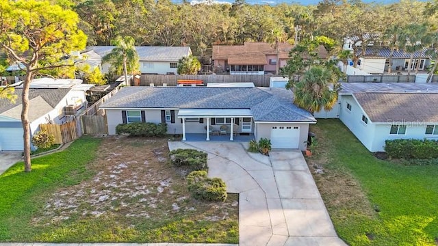 view of front of home with a front lawn and a carport