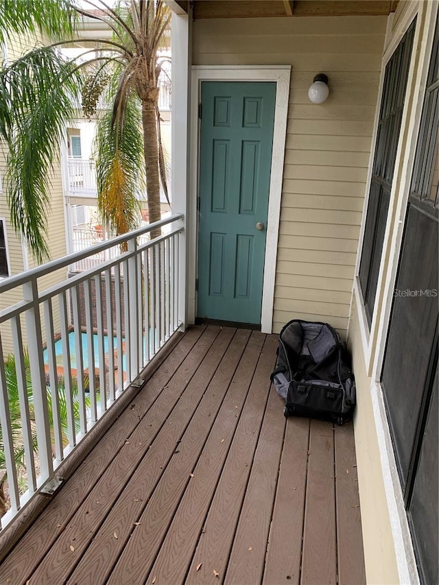 property entrance with a balcony