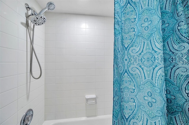 bathroom featuring shower / bath combination with curtain