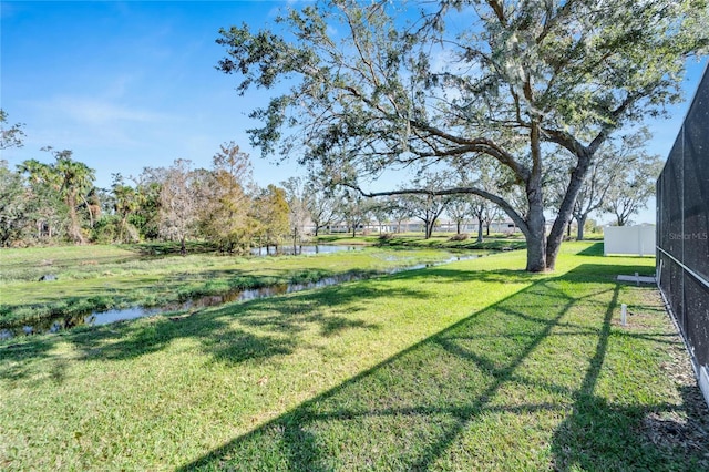 view of yard with a water view