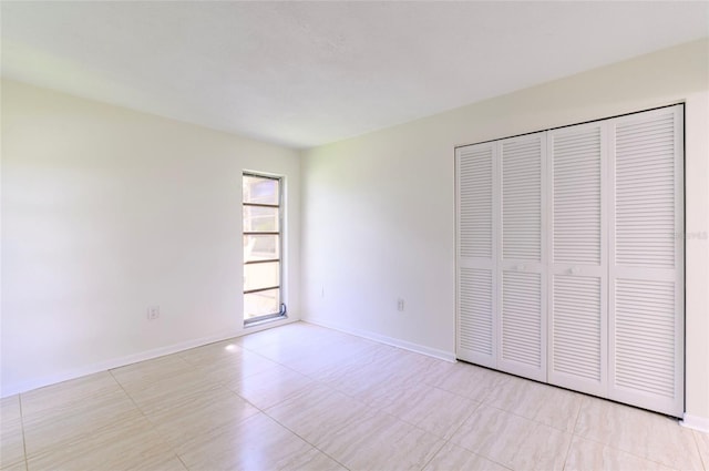 unfurnished bedroom featuring a closet