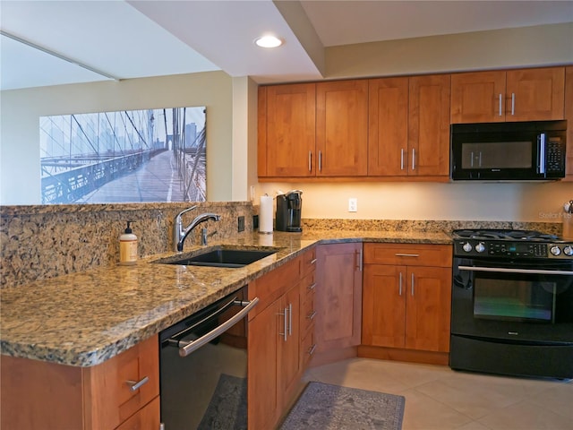 kitchen featuring black appliances, sink, light stone countertops, light tile patterned floors, and tasteful backsplash