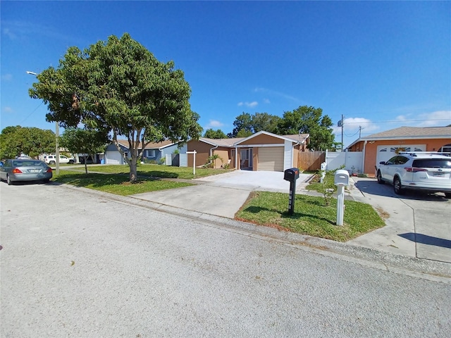 single story home with a front lawn