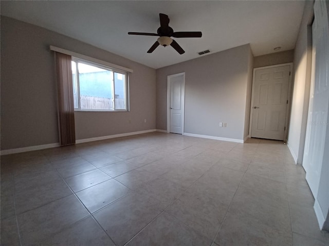 spare room featuring ceiling fan