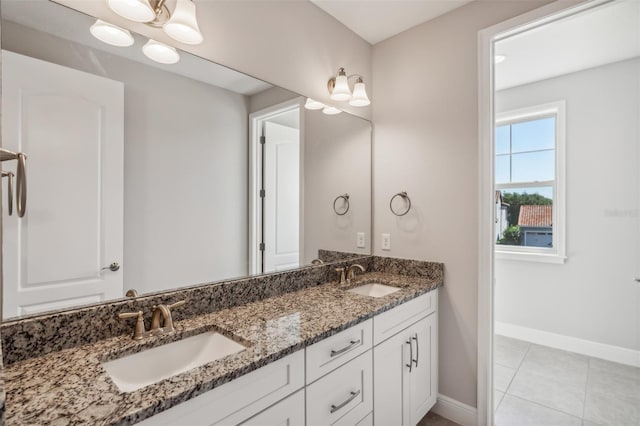 bathroom with vanity and tile patterned floors