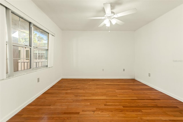 unfurnished room with ceiling fan and light hardwood / wood-style floors