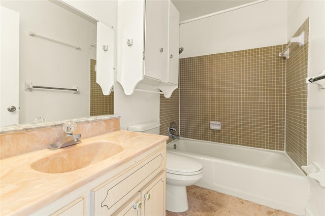 full bathroom with tile patterned floors, vanity, toilet, and tiled shower / bath