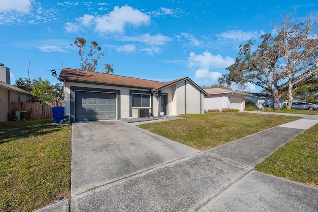 ranch-style house with central air condition unit, a front lawn, and a garage