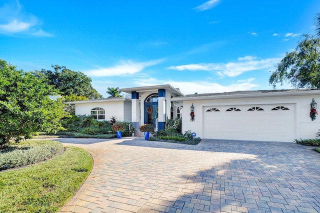 view of front of home featuring a garage