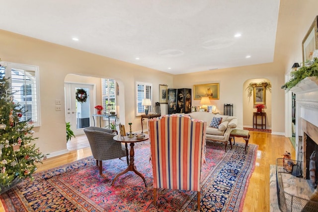 living room with light hardwood / wood-style flooring