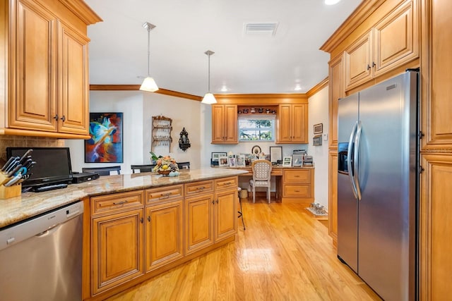 kitchen featuring light stone countertops, hanging light fixtures, light hardwood / wood-style flooring, crown molding, and appliances with stainless steel finishes