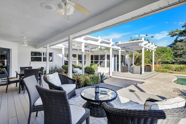 sunroom / solarium with ceiling fan