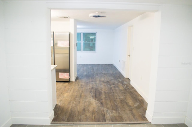 hall featuring dark wood-type flooring