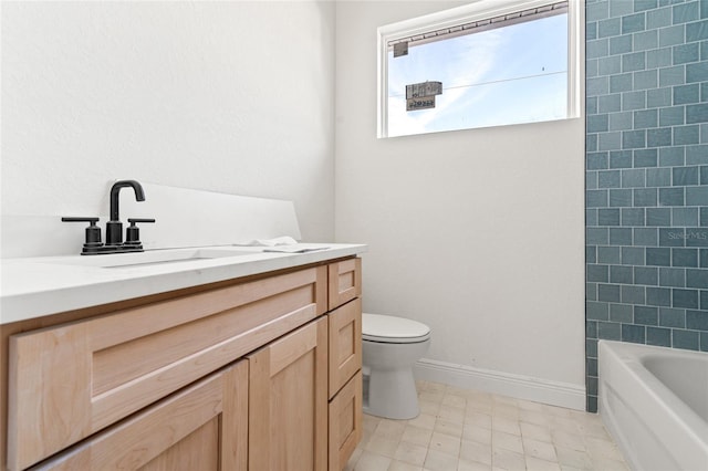 full bathroom featuring vanity, toilet, and  shower combination