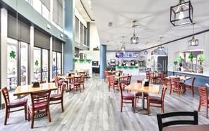 dining space with light wood-type flooring