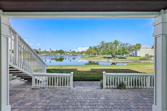 view of patio / terrace featuring a water view