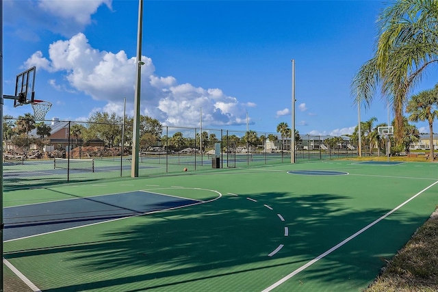 view of sport court featuring tennis court