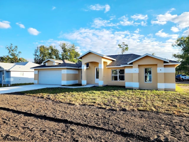 ranch-style home with a front yard and a garage