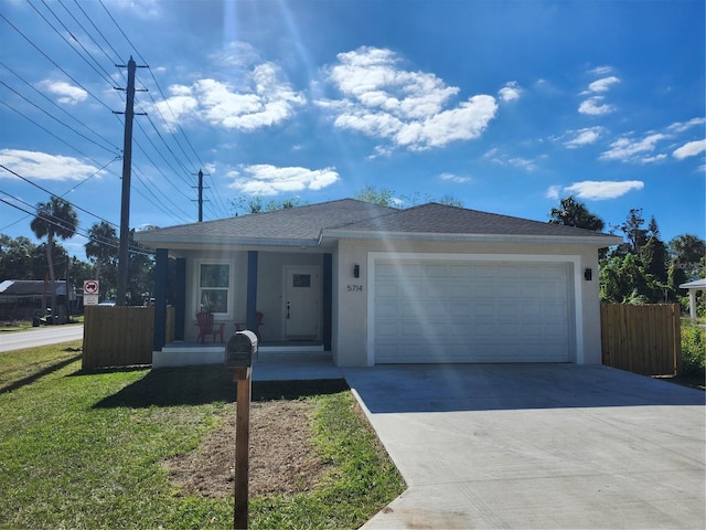 5714 Olive Dr, New Port Richey, FL 34652 - ranch-style house featuring stucco siding, concrete driveway, covered porch, a garage, and a shingled roof