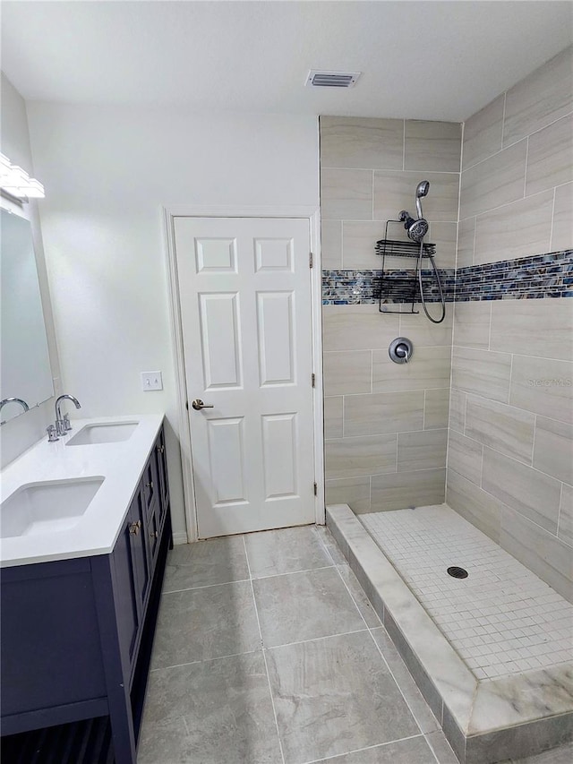 5714 Olive Dr, New Port Richey, FL 34652 - full bathroom with tiled shower and double vanity