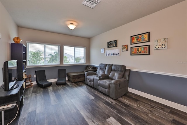 living room featuring dark wood-type flooring