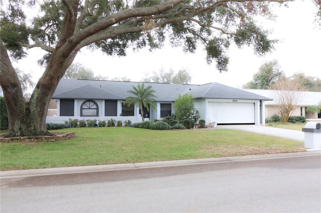 ranch-style home featuring a garage and a front lawn