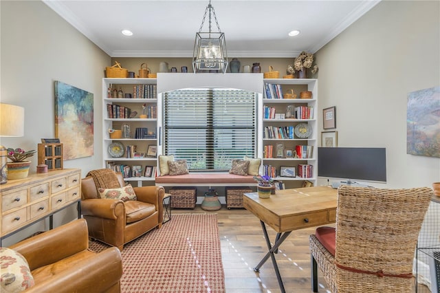 office space with light hardwood / wood-style floors and ornamental molding