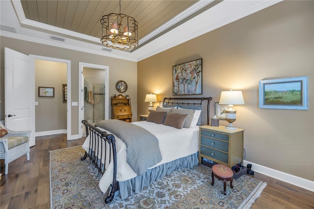 bedroom featuring dark hardwood / wood-style flooring, wood ceiling, a tray ceiling, crown molding, and a chandelier